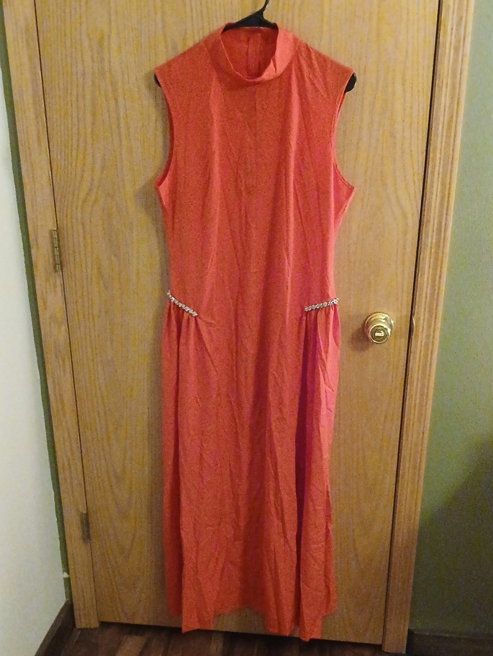 Sleeveless Coral Maxi Dress with High Neck and Waist Embellishments